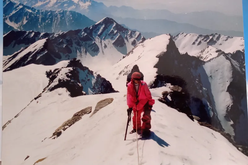 A trekker looking out over the Himalayan ridgelines