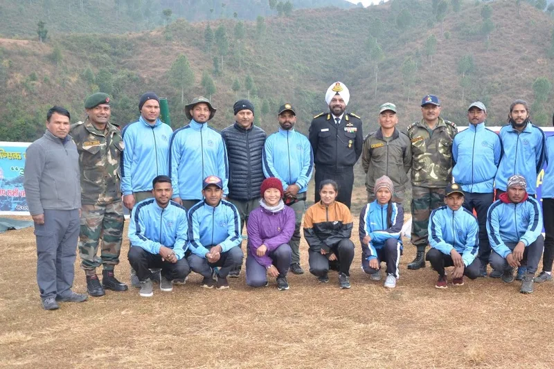 The ICE team with a visiting officer at a training and recognition event